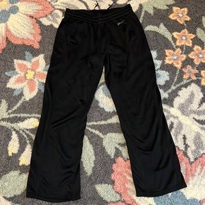 Womens black Nike open leg sweatpants size small, very gently used. Like new.